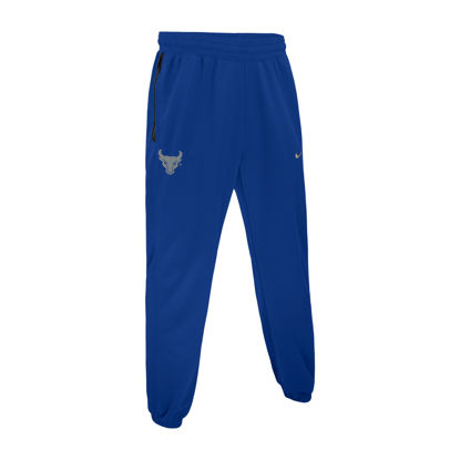 royal blue Nike Spotlight sweatpants with grey spirit mark on hip